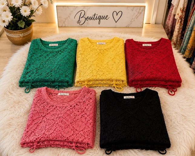 Five lace tops displayed side by side in green, yellow, red, pink and black